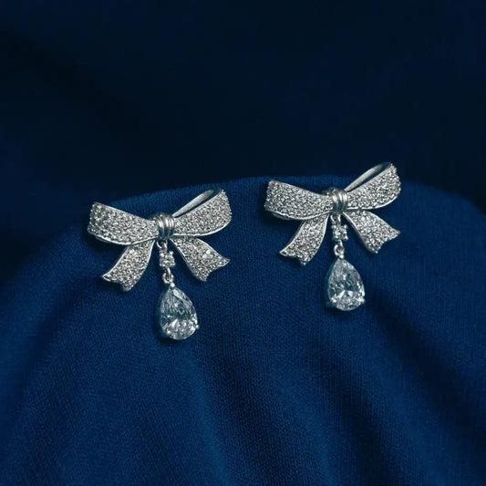Silver Bow Dangle Earrings